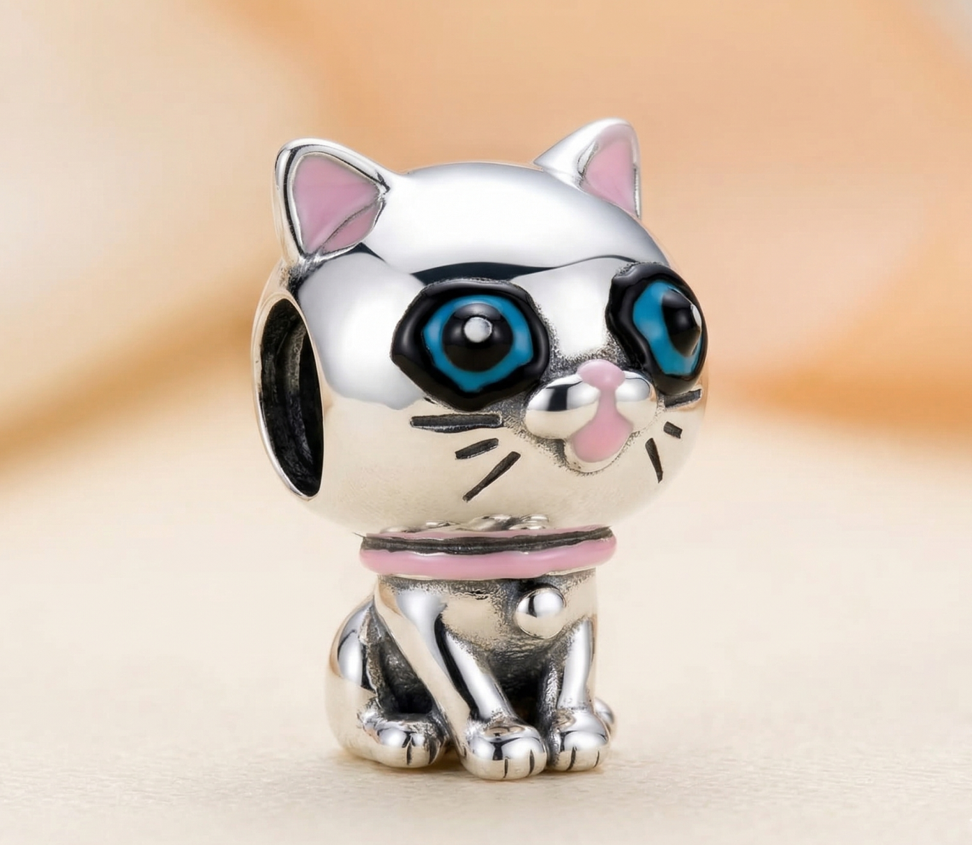 Charm gato ojos azules