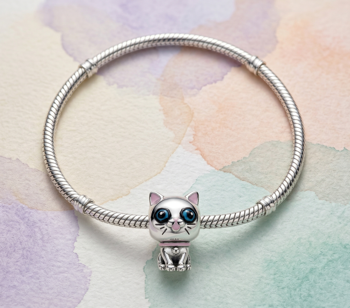 Charm gato ojos azules