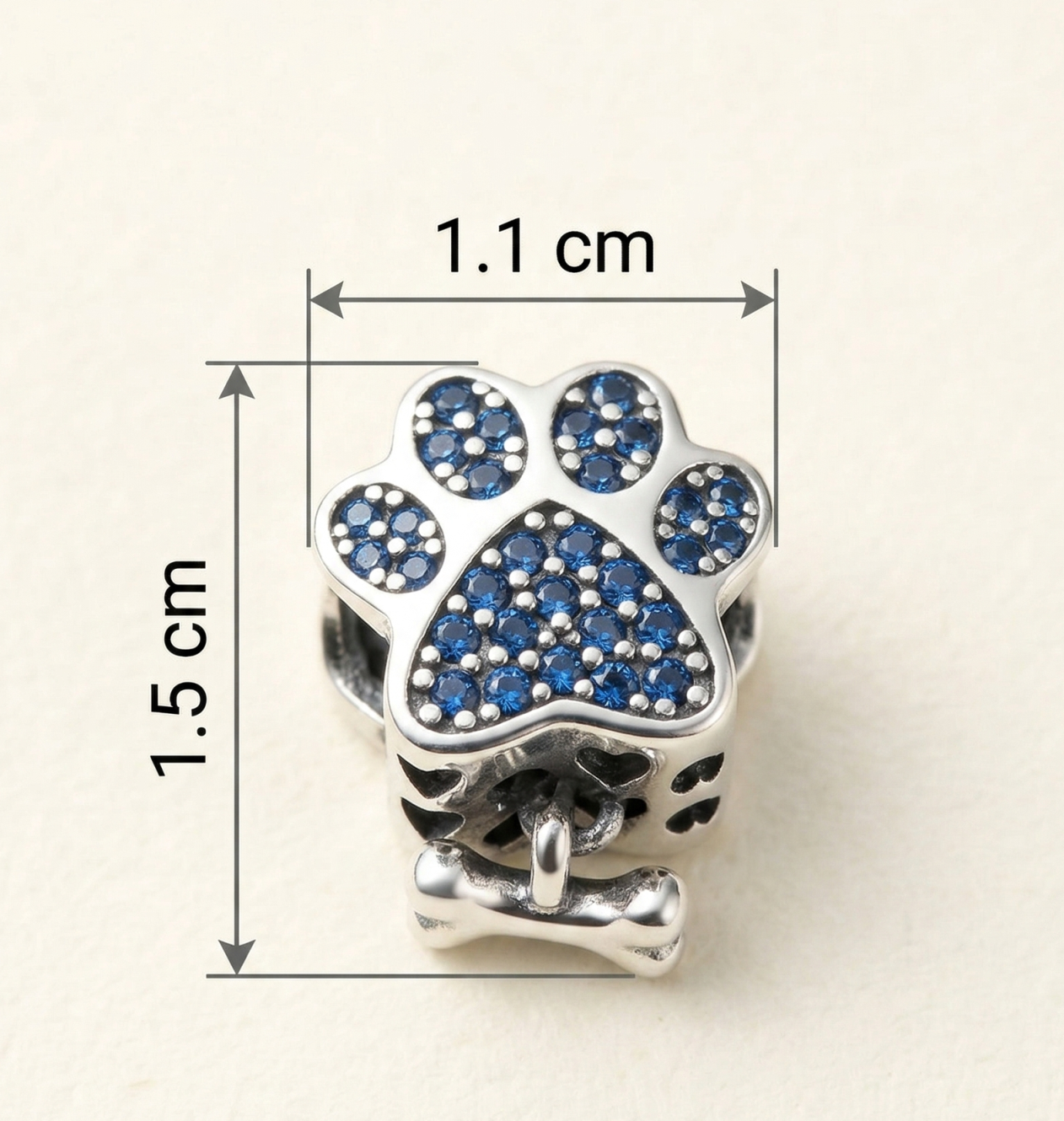 Charm huellita azul