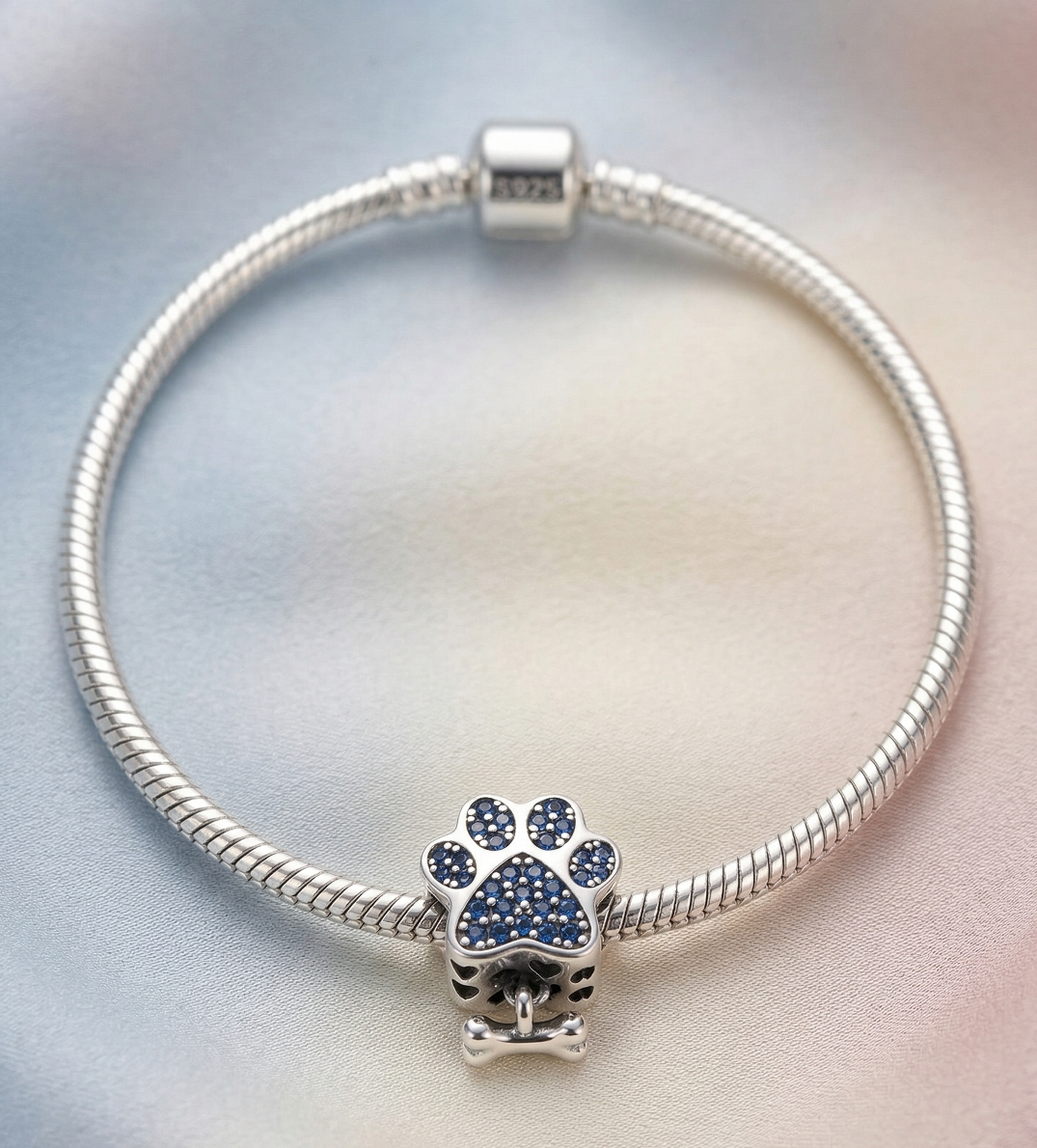 Charm huellita azul