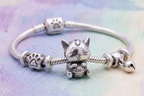 Charm gato ovillo de lana
