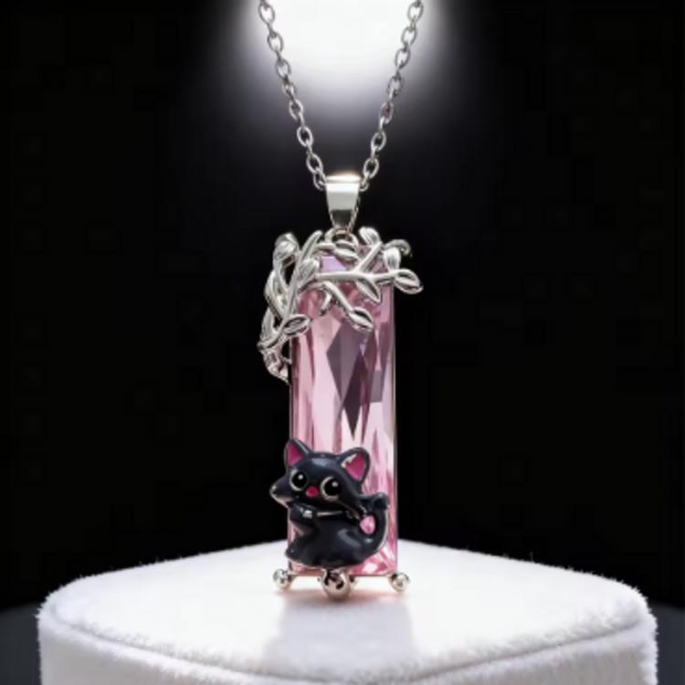 Dije + Cadena Gato sobre cristal rosa