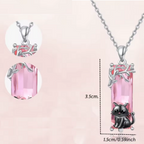 Dije + Cadena Gato sobre cristal rosa